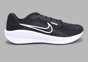 Zoomed-in Nike swoosh logo on the side of Downshifter 13