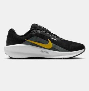 Durable rubber sole of Nike Downshifter 13 with multi-directional grip pattern